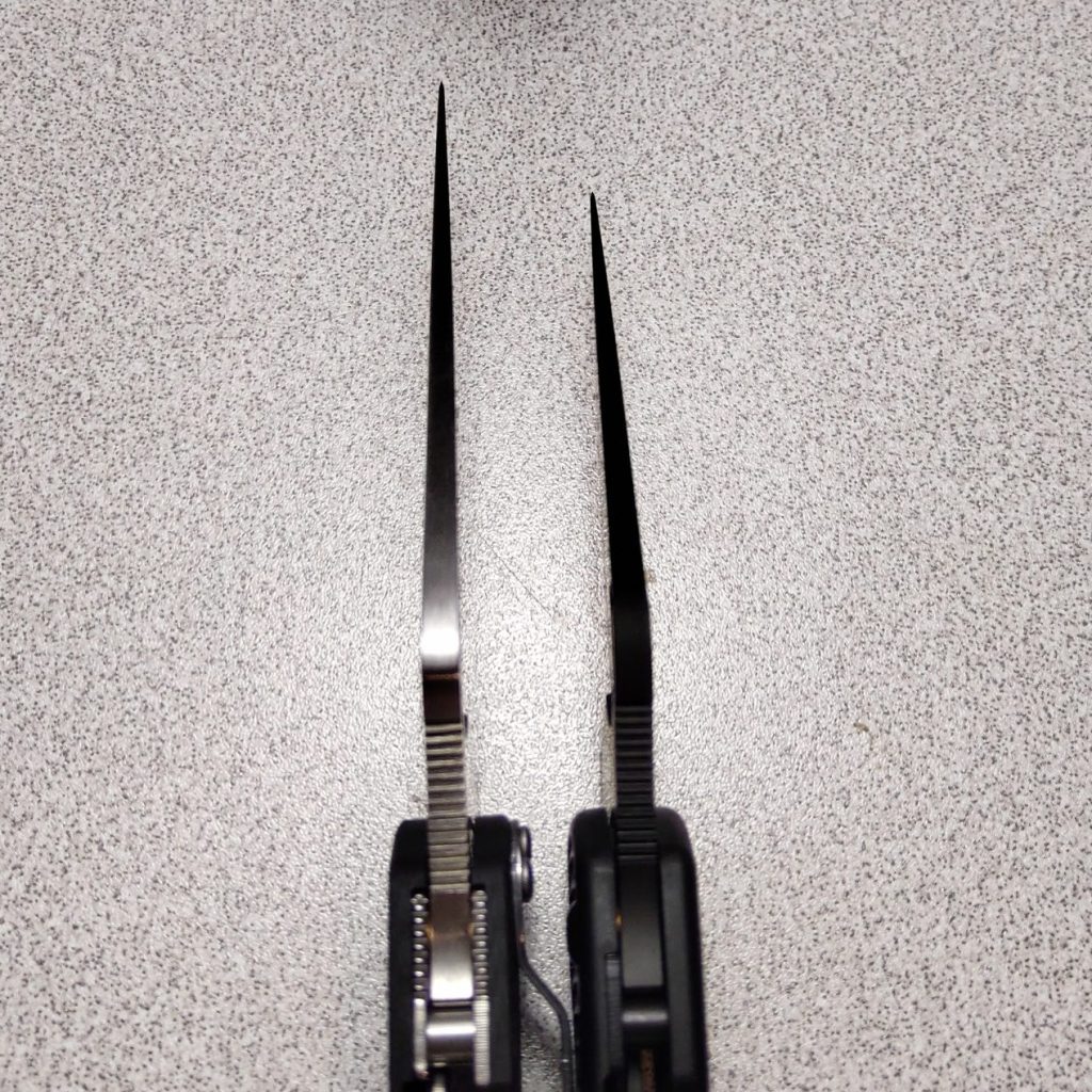 A Sypderco Paramilitary 2 and Para 3 Lightweight side by side, looking down at their spines.