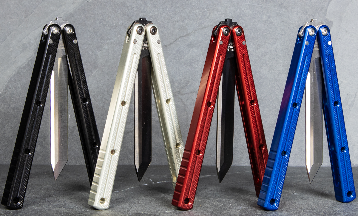 Four Squid Industries balisong knives standing on their ends, partially opened.
