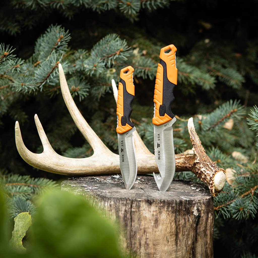 buck pursuit knives, one with gut hook