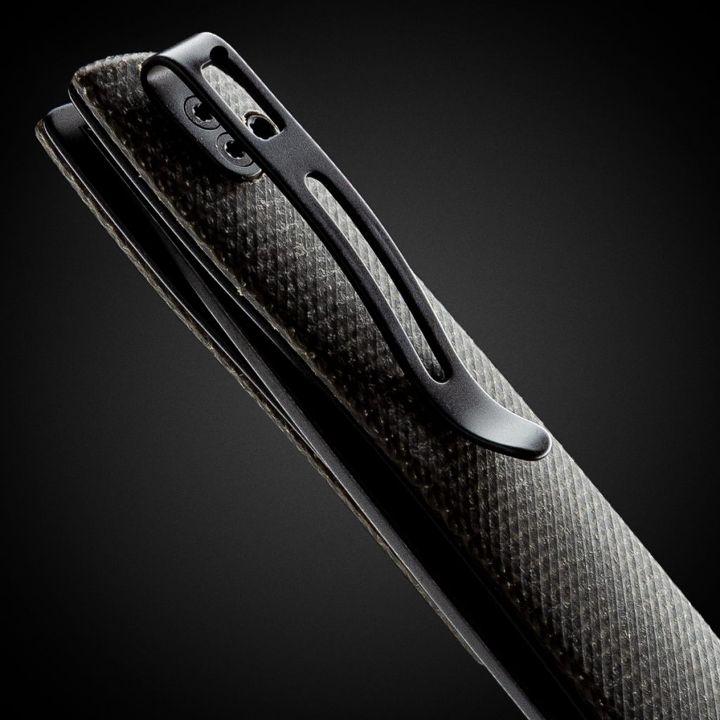 Close-up of a deep-carry pocket clip in black on a folding knife