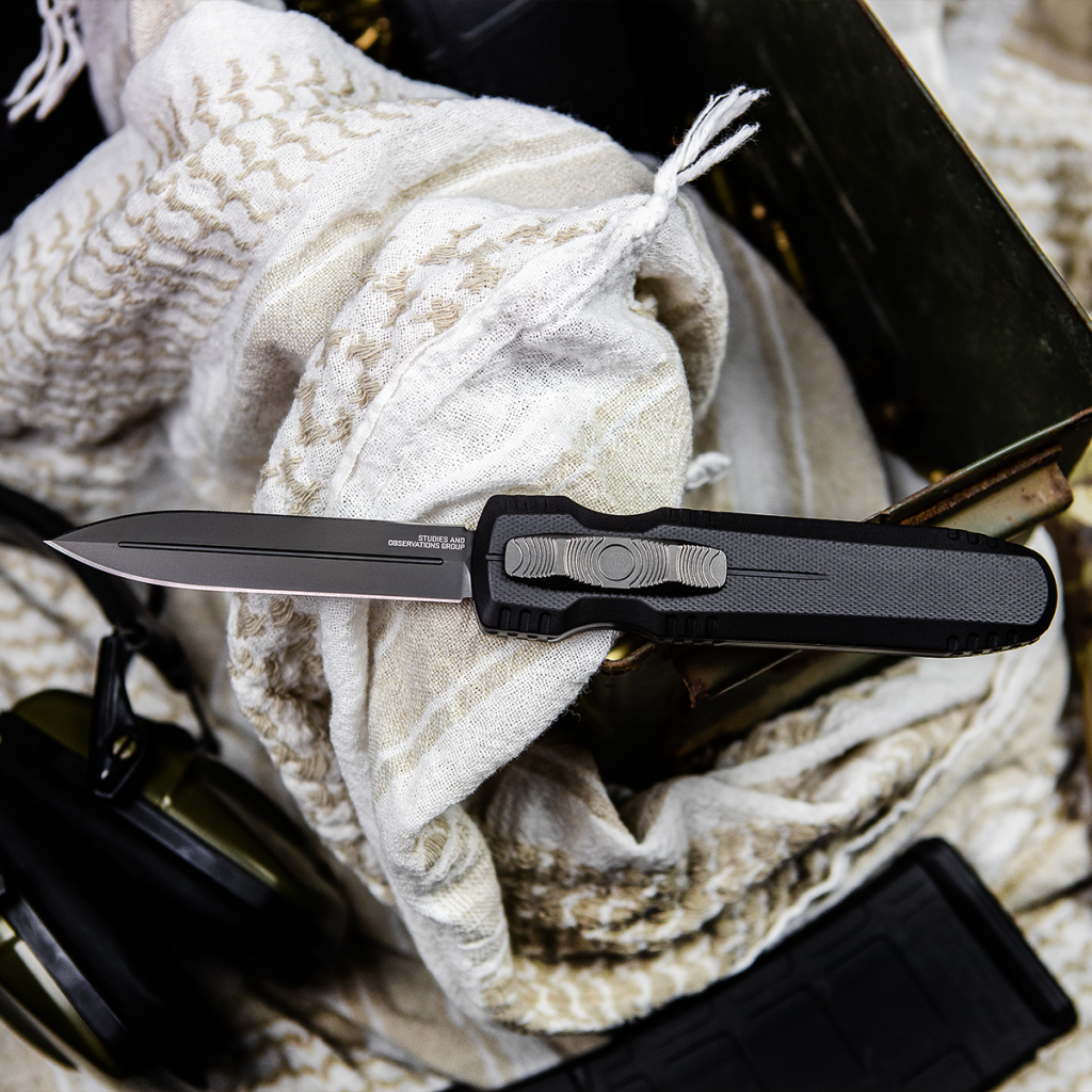 SOG Pentagon with black finished blade and handle. Features distinctive large thumb slide. 