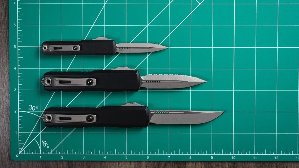 Microtech Ultratech, UTX-85, and UTX-70 on green mat